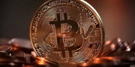 "بيتكوين" تتراجع دون 80,000 دولار بفعل توقعات رفع الفائدة الأمريكية