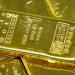 الذهب يهبط مع توقعات رفع الفائدة الأمريكية
