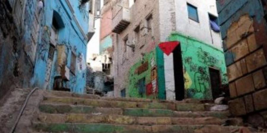 غزة فى القلب.. "معتز" رسم جرافيتى عن فلسطين بأحد شوارع الدرب الأحمر