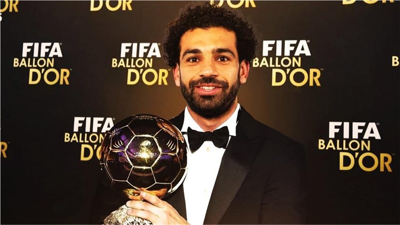 هاري كين يفوز بالكرة الذهبية بلا كأس عالم أو دوري أبطال.. فلماذا لم تُمنح لصلاح؟